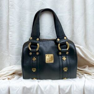 Authentic MCM Black and Gold Satchel with Structured Design